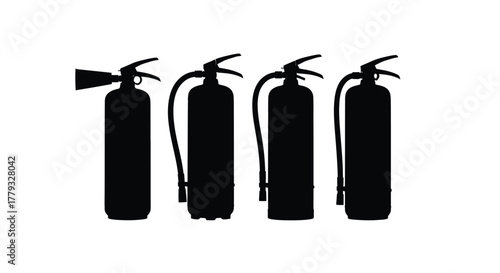 Four fire extinguishers in a row isolated on white background for safety