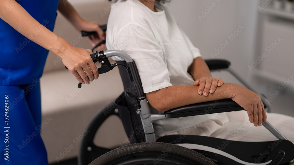 Obraz premium Caregiver gently pushes elderly patient wheelchair home providing professional nursing care and compassionate mobility assistance for their health and wellbeing