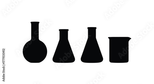 Four black laboratory glassware isolated on white background are displayed