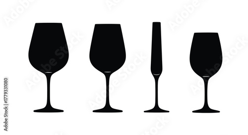 Four wine glasses isolated on white background, each with a unique shape