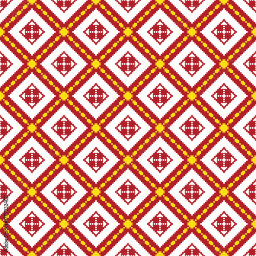 A pixel art pattern in red, yellow, and white arranged in repeating diamond shapes, resembling traditional woven fabric or vintage tiled mosaic design, seamless geometric pattern