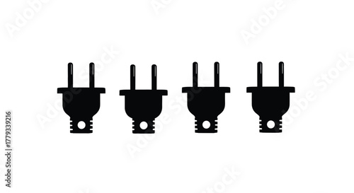 Four electrical plugs in a row isolated on white background