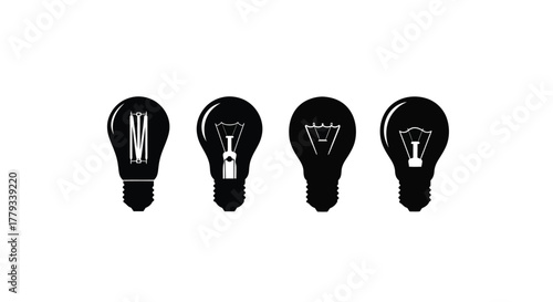 Four light bulbs with different filament designs isolated on white background