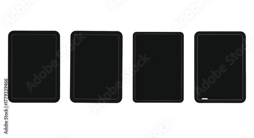 Four black tablet silhouettes isolated on white background, modern technology