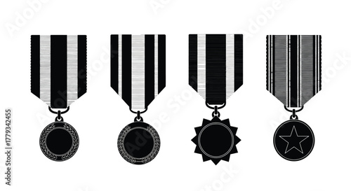 Four black and white military medal isolated on white background in a row