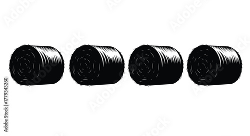 Four hay bales isolated on white background