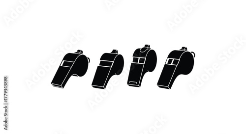 Four black whistles isolated on white background, ready for use in sports