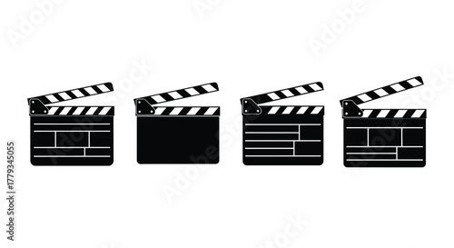 Four black and white clapperboards isolated on white background