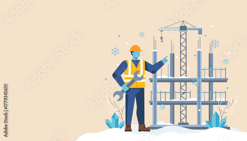 Construction worker in safety gear holding a wrench at a snowy winter building site