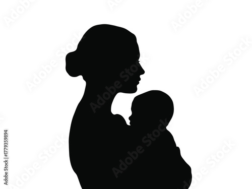 Silhouette of a mother holding her baby close