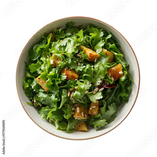 Fresh Mixed Green Salad With Apple Chunks and Granola Served in a White Bowl.