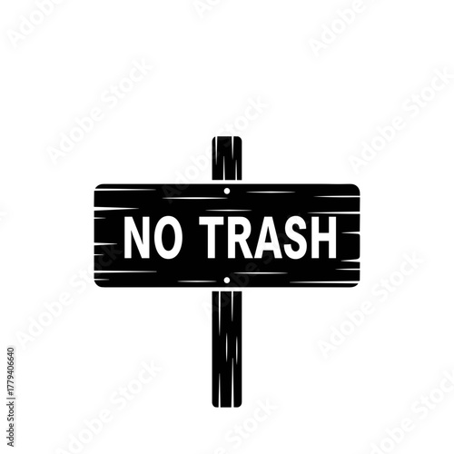 No trash sign on wooden post in black and white design