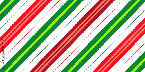 Christmas candy cane striped seamless pattern. Christmas candy cane background with red and green stripes. 