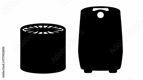 Two black silhouette objects one cylindrical with a patterned top and one rounded rectangular shape