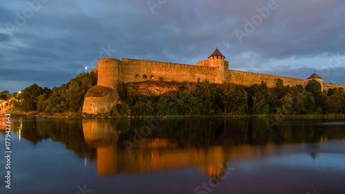 Ivangorod Fortress on the Narva River at dusk, Estonia.