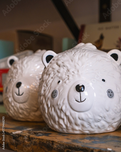 Cute Ceramic Bear Jars on Rustic Wooden Shelf
