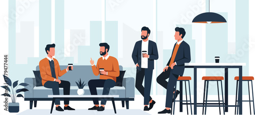 Four men in business attire converse and relax in a modern, bright office lounge area, holding coffee cups.