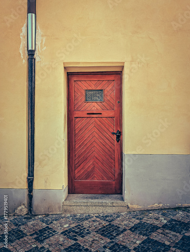 Historic ornate doorway with Latin inscription