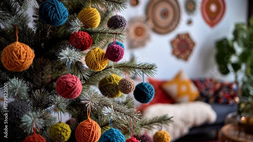 Cozy living room with yarn decorated Christmas tree and vibrant wall art