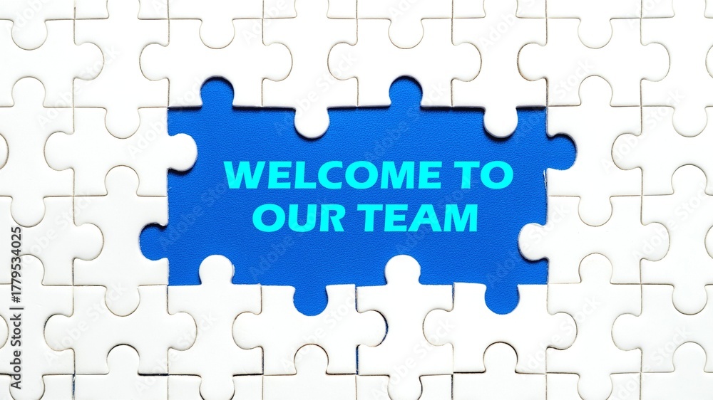 Fototapeta premium The concept of the words Welcome To Our Team in the middle of the puzzle. The background is light blue.