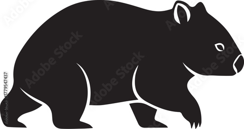 Black silhouette of a wombat walking side view against a