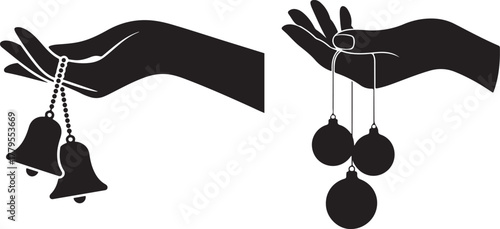 Silhouette of hand holding two hanging bells offering.