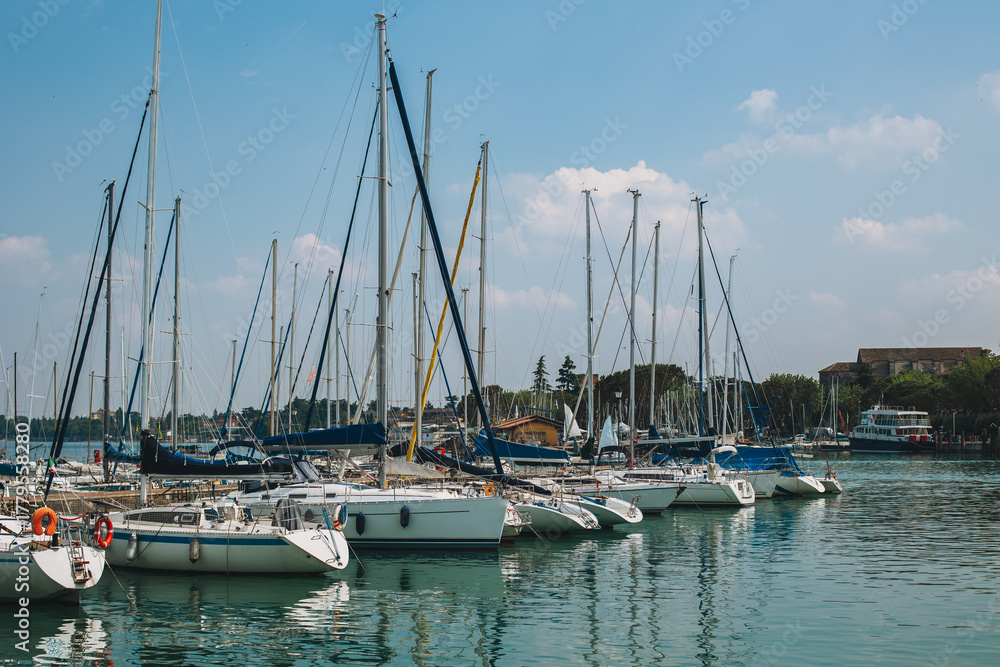 Fototapeta premium Amazing view of yacht marina in Desenzano del Garda. Italy. Beautiful sunny day.