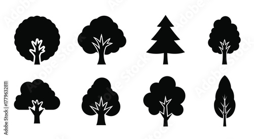 Collection of simple black silhouette trees and foliage elements displayed