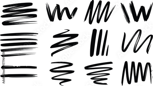 Collection of black hand drawn brush strokes and scribbles on white background