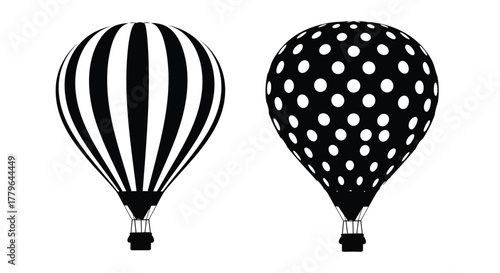 Two black and white hot air balloons with different patterned designs