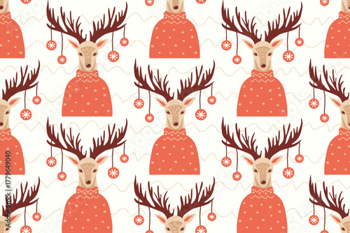 Christmas seamless pattern with cute reindeer in knitted sweaters and Christmas tree decorations on their antlers. Hand-drawn animal portraits. Ethnic-style holiday background.