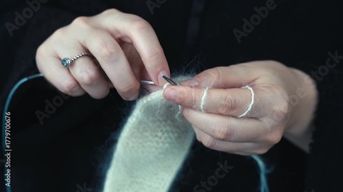 Woman Knitting with White Wool. Handmade Craft and Cozy Creativity