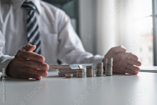 Hands cover currency for a secure financial reserve and protection concept