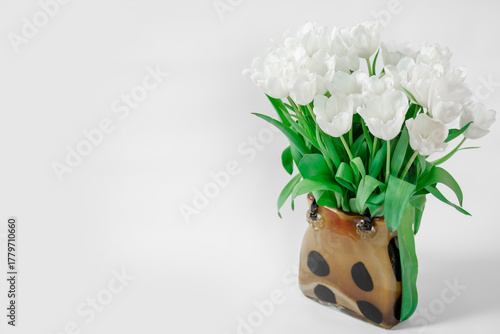 white tulips in vase