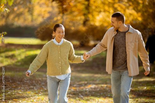 Couple taking a joyful stro...