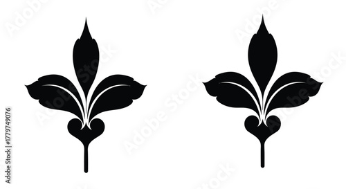 Two elegant black fleur de lis symbols displayed on a white background