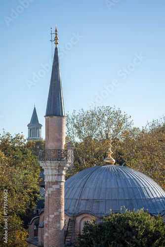 Historic Ottoman mosque minaret and dome in Istanbul
