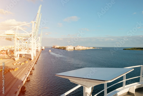 Flat Satellite Communication Terminal on Ship Deck Overlooking Harbor and Coastal City, VSAT Internet