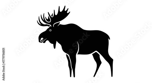Silhouette of a majestic moose with large antlers standing proudly.