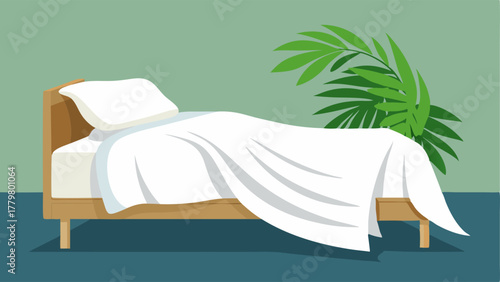 A bedroom with a platform bed dressed in crisp white linens and adorned with a palm leaf print throw blanket.