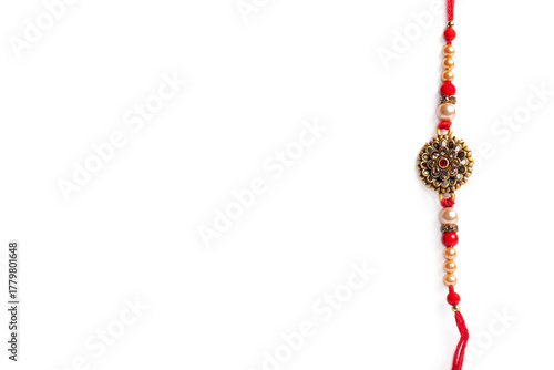 Obraz na płótnie beautiful decorative thread bangle with a decorative design on a white background for Raksha Bandhan.