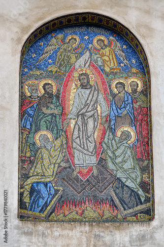 Colorful mosaic icon on the wall of old church in Suceava, Romania