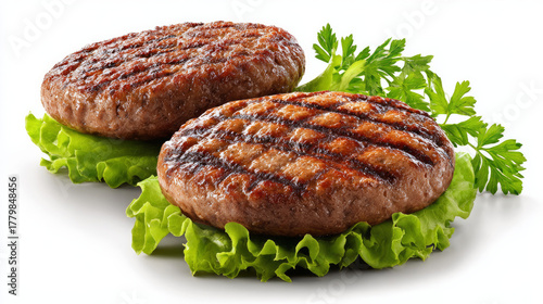 Isolated freshly grilled hamburger patties on a white background