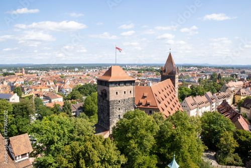 Panoramic view of Kaiserburg Nürnberg Castle from Sinwell Tower, Nuremberg, Germany, showcasing medieval architecture, royal palace, and historic gardens.