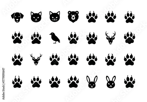 A diverse collection of black silhouette animal head icons and paw print tracks. Vector set featuring dog, cat, bear, deer, and rabbit