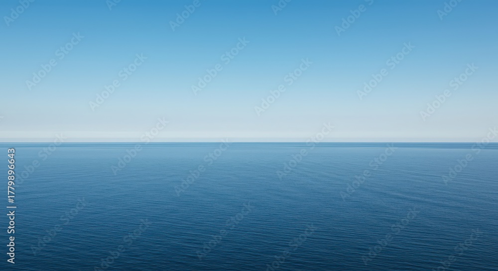 Obraz premium An immense, uninterrupted seascape focusing on the distant meeting point of the smooth, calm ocean surface and the clear, wide sky, sky, bright, pure