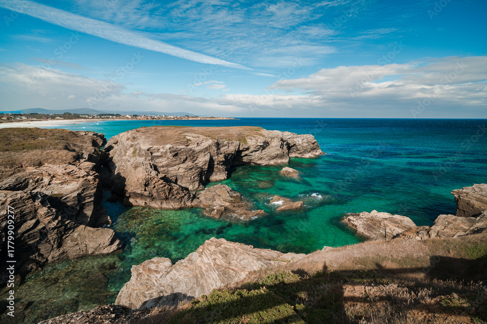 Fototapeta premium Las catedrales beach exploring rugged cliffs and clear turquoise ocean