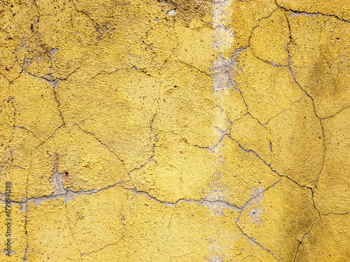 Old grunge wall surface yellow wall.