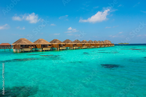 Fototapeta Naklejka Na Ścianę i Meble -  Tropical island beach landscape exotic shore coast. Tranquil closeup calm sea water waves with palm trees. Beautiful Panorama. Summer vacation, holiday amazing nature. Relax paradise, Maldives.
