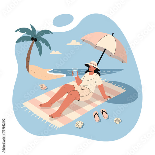 Woman Relaxing on Beach Towel with Drink Under Umbrella.
